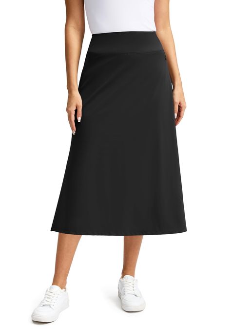 PRICES MAY VARY. Modest Midi-length Skirt: Coming in at 28-inches long, it's a more modest option than others, especially for those who prefer not to show much skin. Midi skirts designed with a simple A-line silhouette a fitted waist and slightly flared, relaxed skirt — which, in addition to complementing all body types. High-waisted Skirts with Shorts: Built-in shorts provide full coverage and do not roll up. The wide waistband includes a hidden inner drawcord to customize the fit for your body Shoes To Wear With Skirts, Long Skort, Midi A Line Skirt, Petite Skirts, Flowy Skirts, Travel Skirt, Waisted Skirts, Midi Skirt With Pockets, Long Skirt Outfits