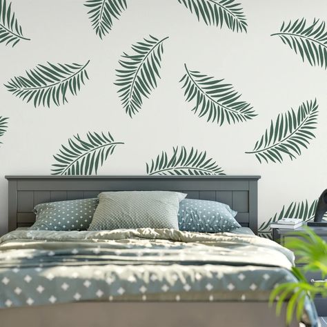 Minimalistic art, geometric patterns, and simple, functional accessories. Decorations Drawing, 2023 Home Interior, Leaf Wall Stencil, Modern Wall Stencil, Modern Living Room Design Ideas, Wall Stencil Designs, Room Makeover Ideas, Palm Leaf Pattern, Stencil Wall Art