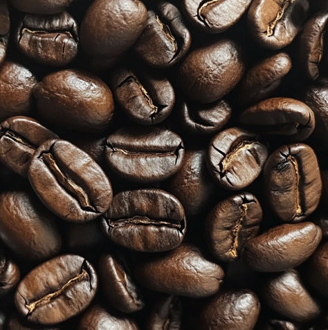 Close-up of roasted coffee beans in rich brown tones, highlighting the texture and deep color of a medium-dark roast from Headcount Coffee. Perfect Roast, Coffee Guide, Roasts, Dark Roast, Floral Notes, Coffee Roasting, Choose The Right, Your Perfect, Finding Yourself