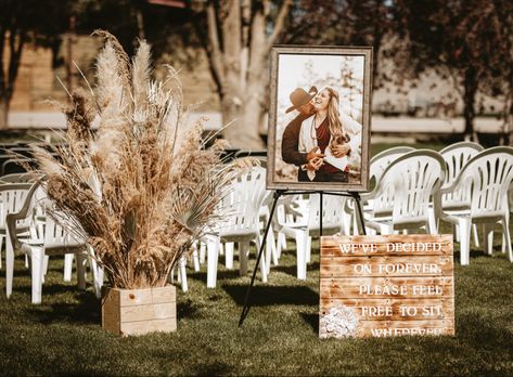 Boho wedding decor, ceremony aisle entry Isle Entry Decor Wedding, Western Wedding Signs Diy, November Backyard Wedding Ideas, Outdoor Ranch Wedding Decor, Rustic Fall Wedding Aisle Decor, Cow Hide Wedding Aisle Runner, Boho Western Fall Wedding, Boho Western Wedding Ceremony Decor, Simple Country Wedding Ideas Outdoor Ceremony