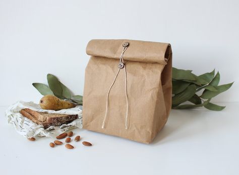 Brown Kraft washable paper lunch bag with natural coconut buttons and waxed cotton twine tie around closure. This type of closure is ideal - easy Leather Lunch Bag, Sandwich Wrap, Paper Bag Design, Washable Paper Bag, Paper Lunch Bags, Paper Food, Paper Lunch, Cheap Toys, Washable Paper