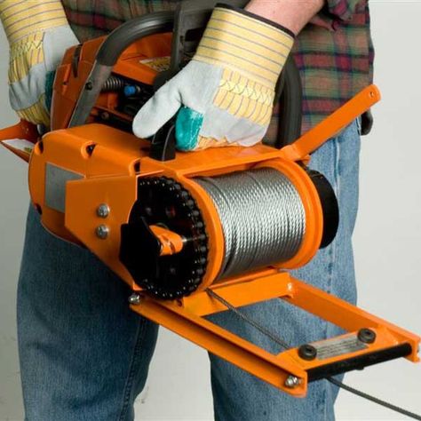 The Lewis Winch can be powered by any chainsaw motor that’s 3 cu. in. or larger. ------------------------------------------------- C... Chainsaw Mill Plans, Garden Tractor Attachments, Power Winch, Timber Frame Joinery, Chainsaw Mill, Logging Industry, Farm Show, Tractor Attachments, Recycling Machines