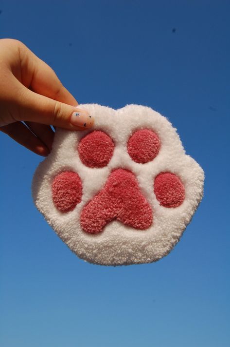 🐾 Discover Our Adorable Tufted Paw Coasters! 🐾

✨ Why You'll Love Them:
🌈 Unique and Handcrafted: Each coaster is lovingly hand-tufted, making it one-of-a-kind and adding a pop of personality to your space.

🌟 High-Quality Materials: Crafted with care using durable materials, these coasters are as practical as they are charming.

🎁 Great for Gifting: Surprise the animal lover Small Tufting Rugs Ideas, Rug Tufting Design Ideas, Tufted Coasters, Tuft Coaster, Rug Coaster, Easy Tufting Ideas, Tufting Coaster, Mini Tufted Rug, Tufted Coaster