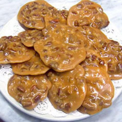 This is a favorite with my family...Seems like I can't ever make enough...They are good to give as gifts are just to keep on hand for guests...I hope you will enjoy...Caution...Don't try to make these on a damp humid day.  They just want harden up if you do. Microwave Pralines Recipe, Microwave Pralines, Cajun Cooking Recipes, Pralines Recipe, Praline Candy, Praline Recipe, Louisiana Seafood, Cajun Cooking, Pecan Pralines