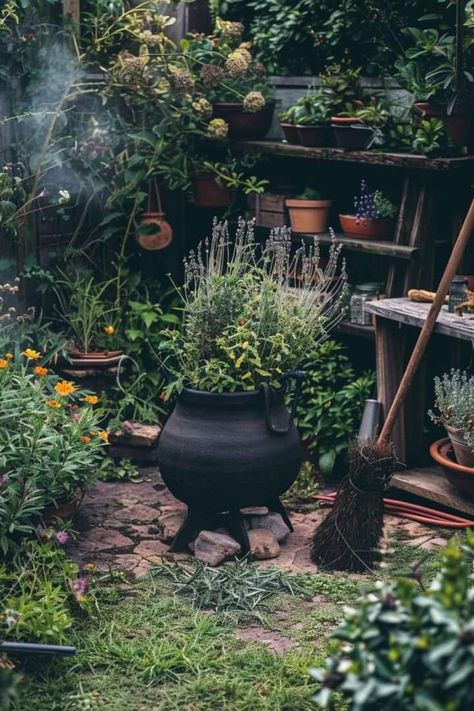 Green Witch Cottage Aesthetic, Witch Patio Decor, Outdoor Cauldron Ideas Halloween, Witches Herb Garden, Garden Cauldron, Goth Garden Decor, Herbal Garden Ideas, Witchy Garden Ideas, Witchy Garden Aesthetic