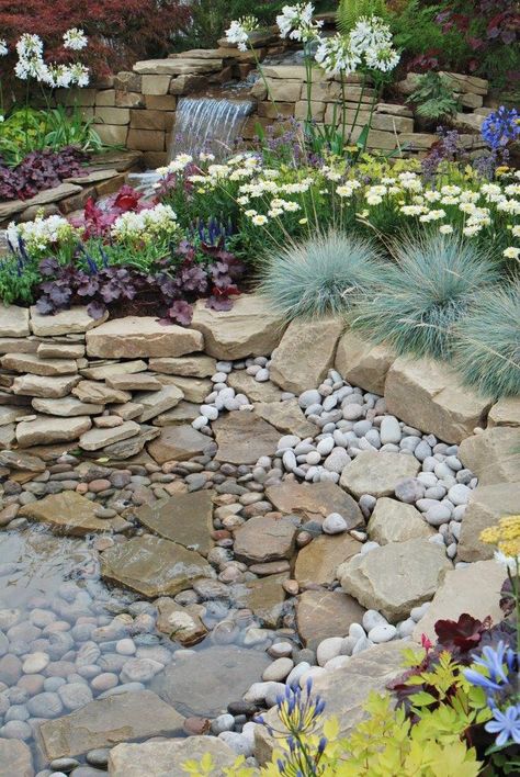 A fantastic use of rockery stone and cobbles to create this beautiful water feature. Modern Rockery Garden Ideas, Backyard Fountain, Rockery Garden, Garden Pond Design, Fountains Backyard, Exquisite Gardens, Rock Garden Design, Pond Landscaping, Backyard Water Feature