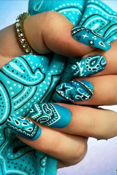 15 Amazing Modern Paisley Nails Designs Will Impress Anyone You Meet https://www.polishandpearls.com/paisley-nails-designs/ Nails With Feathers, Country Nails Design, Country Nail Ideas, Country Nail Designs, Paisley Nails, Paisley Nail Art, Aztec Nail Designs, Rodeo Nails, Bandana Nails