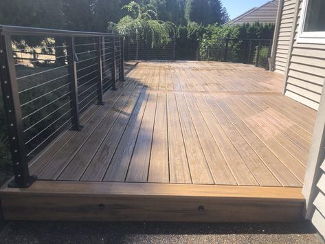 Trex Havana Gold deck with cable rail | Deck Masters, LLC Trex Havana Gold Deck, Trek Deck, Black Railing, Trex Transcend, Pressure Treated Deck, Deck Pictures, Hardwood Decking, Patio Deck Designs, Trex Deck