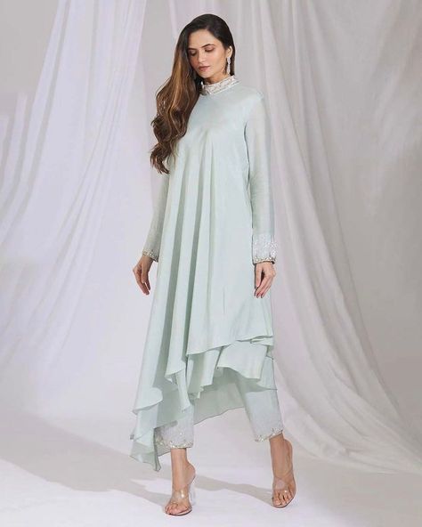 Ariyana Couture on Instagram: "Elevate your ethnic wardrobe with our powder blue kurta set featuring a chic asymmetric hem & placement beadwork. #ariyanacouture…" Layered Kurta, Asymmetric Kurta, Fancy Kurti, Couture Embroidery, Blue Saree, Party Wear Indian Dresses, Couture Designers, Silk Gown, Organza Dupatta