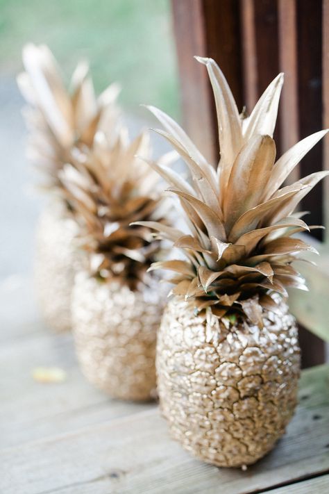 Spray-Painted Pineapples: Spray-painting real pineapples is a cheap and easy DIY, and they are a great addition to the party decor.  Source: KCB Photography Ibiza Party, Pina Coladas, Snowman Crafts Diy, Tropical Bridal, Chic Bridal Showers, Tropical Bridal Showers, Fiesta Tropical, Pineapple Parties, Bollywood Party