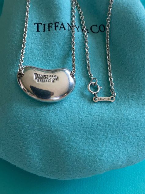 Tiffany & Co. Elsa Peretti Sliver Large Bean Pendant Necklace https://www.etsy.com/listing/1300696691/tiffany-co-elsa-peretti-sliver-large Tiffany And Co Necklace Tiffany & Co., Tiffany Bean, Tiffany Bangle, Return To Tiffany Necklace, Diamond Pendant Necklace Tiffany & Co., Pendant Jewelry Tiffany & Co., Hardware Necklace Tiffany, Bean Necklace, Silver Pendant Necklace Tiffany & Co.