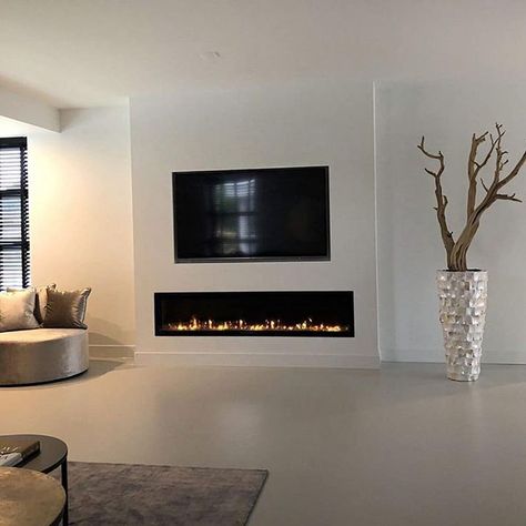 Tv Fireplace Wall Ideas Bedroom, Minimalist Modern Fireplace, White Walls White Fireplace, Tv Wall Electric Fireplace, Gas Fireplace Tv Wall, Fireplace Tv Wall Bedroom, Modern Electric Fireplace Ideas With Tv, Tv Wall Design With Fireplace Modern, Tv And Fire Wall Ideas Modern