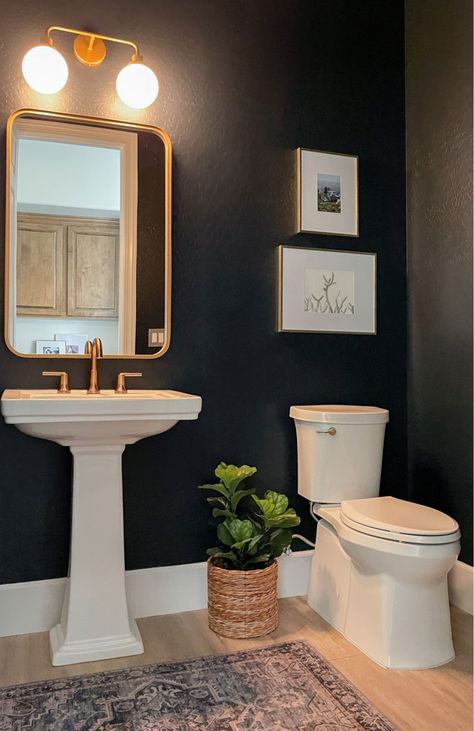 Powder Room With Pedestal Sink And Wallpaper, Black Powder Bathroom Ideas, Paint Half Bathroom, Statement Guest Bathroom, Black And Gold Half Bathroom, Half Bathroom Lighting, Black And White Half Bath, Dark Moody Powder Room, Powder Room Ideas Pedestal Sink