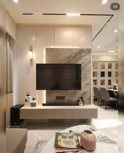 Simple Elegant Tv Unit Designs, Tv Unit Along With Pooja Unit, Tv Unit Design Modern Simple, Partition With Tv Unit Interior Design, Tv Unit Decor Modern Tv Cabinets, Tv Unit Simple, Tv Unit With Hall Partition, Simple Tv Unit, Hall Dining Partition Tv Unit