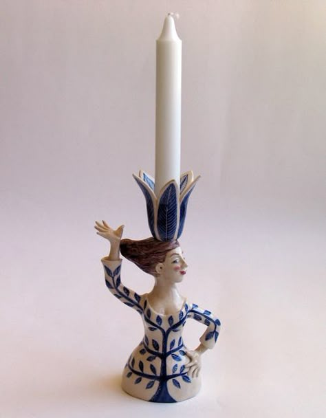 'Woman Candlestick' by Helen Kemp. Functional Ceramic sculpture, handcrafted and handpainted. £215  info@whitehousegallery.com  01557 330223 Functional Ceramic Sculpture, Ceramic Tree Topper, Ceramic Candleabra Ideas, Ceramic Candle Holders Pottery, Museum Ceramics, Pottery Candlesticks, Functional Sculpture, Pottery Candle, Diy Ceramic