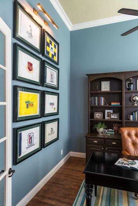 Golf Flag collection in Study by Nicole Arnold Interiors Golf Flags Display, Man Cave Golf Theme, Golf Club Display On Wall, Golf House Decor, Golf Memorabilia Display, Golf Office Decor Ideas, Golf Display Ideas, Golf Theme Office, Golf Decorating Ideas Interior Design