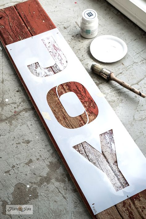 Learn how to make this super festive rustic JOY Christmas porch sign in minutes with stencils, including a snowflake replacing the O! With Funky Junk's Old Sign Stencils Homemade Christmas Signs, Barnwood Signs, Rustic Christmas Porch Signs, Christmas Tree Porch Sign, Joy Porch Sign, Christmas Stencils Wooden Signs, Christmas Signs Wood Front Porches Overstock, Christmas Porch Signs Overstock, Christmas Barnwood Signs