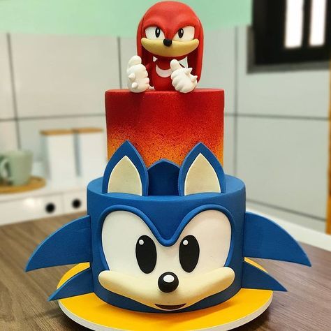 Ideias para festa com o tema Sonic! Instagram: @ateliercoisasdecaio Link postagem: https://www.instagram.com/p/CF… | Sonic birthday parties, Sonic party, Sonic cake Knuckles Sonic Cake, Knuckles Cake Sonic, Sonic And Knuckles Birthday Party, Knuckles Birthday Cake, Sonic And Knuckles Cake, Tort Sonic, Pastel Sonic, Super Sonic The Hedgehog, Captain America Birthday Party