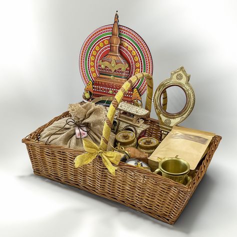 🎉 Celebrate the spirit of Onam with our luxurious Kerala Hamper! ��🌾 This carefully curated basket captures the essence of Kerala’s rich heritage and flavors, making it the perfect gift for any occasion. . . . . . .✨What's Inside: - Spices Box with authentic Kerala spices - Dabara Set for traditional South Indian coffee - Rustic Coconut Shell Spices Candle - Aranmula Kannadi (mirror) - Vibrant Kathakali Face - 200g Banana Chips - 200g Jaggery Chips - 150g Tea Powder Bottle - Wooden Elephant fi... South Indian Coffee, Traditional Hampers, Kathakali Face, Empty Gift Boxes, Hamper Ideas, Apology Gifts, Friend Anniversary, Pen Set Gift, Indian Gifts