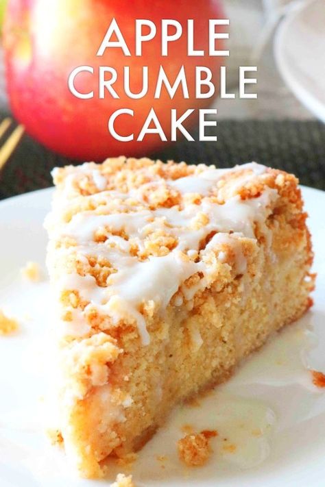 Apple Crumble Cake is fall cake recipe speckled with warm notes of cinnamon, cloves, and nutmeg. Topped off with a crunchy, buttery streusel and ends with a sweet vanilla glaze! Serve it as a little slice of breakfast heaven, a tea time snack, or the perfect addition to any fall dessert table. #applecake #applecrumblecake #cakerecipe #fallrecipes #falldesserts #dessert #cake #applerecipes #apples Apple Crumble Sponge Cake, Applecake Crumble, Fall Desserts Table, Easy Apple Crumble, Apple Crumble Cake, Fall Cake Recipes, Kitchen Sanctuary, Fresh Apple Cake, Crumble Cake