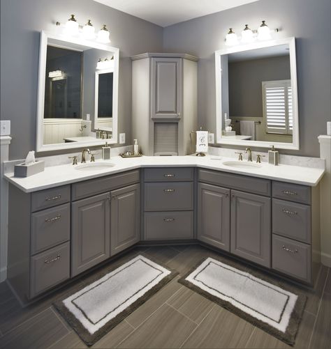 This large corner vanity has striking features with double mirrors and sinks, beautiful cabinetry, carrara marble inspired quartz countertops, and brush nickel fixtures. Corner Cabinet For Bathroom, L Shaped Bathroom, Corner Bathroom Cabinet, Cabinet For Bathroom, Corner Bathroom Vanity, Corner Bathroom, Corner Vanity, Vanity Cabinets, Large Bathroom