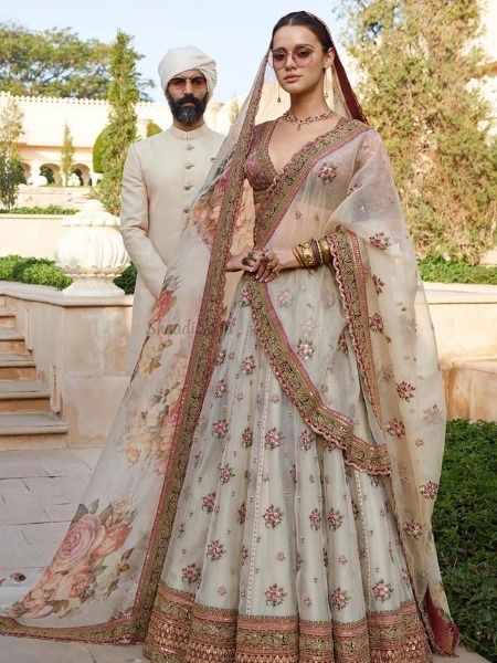 Aspiring a traditional embroidered lehenga with floral pattern? These sabyasachi lehengas are perfect for your Intimate wedding.   #sabyasachibride #sabyasachilehenga #indianwedding #shaadisaga #intimatewedding #bridallehenga #traditionalindianlehenga Sabyasachi Bridal Collection, Sabyasachi Lehenga Cost, Sabyasachi Lehenga Bridal, Sabyasachi Bridal, Sabyasachi Bride, Bridal Lehenga Designs, Sabyasachi Lehenga, Bridal Outfit, Red Lehenga