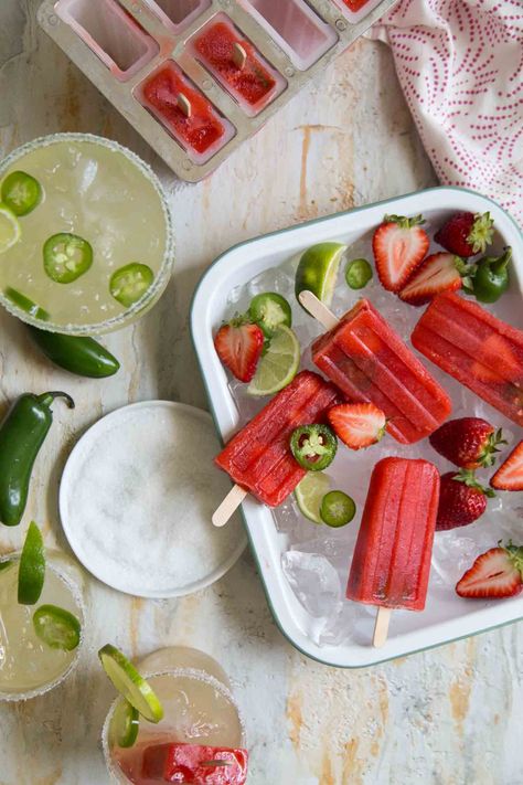 STRAWBERRY JALAPEÑO MARGARITA POPSICLES Strawberry Jalapeno Margarita, Margarita Popsicles, Strawberry Tequila, Frozen Pops, Jalapeno Margarita, Jalapeno Recipes, Jalapeno Peppers, Boozy Desserts, Pineapple Rum