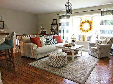 Fall decor in living room with Ikea hack plank coffee table and striped drapes-www.goldenboysandme.com Split Level Decorating, Striped Drapes, Level Living Room, Rooms Decoration, Furniture Placement Living Room, Ikea Living Room, Living Room Furniture Layout, Living Room Furniture Arrangement, Furniture Placement