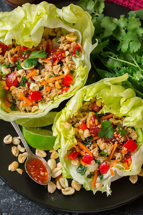 Thai Chicken Lettuce Wraps - These Thai Chicken Lettuce Wraps are everything I’d hoped they’d be and then some! They are so flavorful and easy to throw together and they have the perfect crunch factor! I don’t usually do lettuce wraps for dinner because they aren’t filling enough for me, but these are so happening all the time for dinner (I’ll probably just serve them with a side of rice for a more filling meal – because I need my carbs). Hot Thai Kitchen, Thai Lettuce Wraps, Thai Chicken Lettuce Wraps, Cookies Banane, Chicken Thai, Chicken Lettuce Wraps Recipe, Thai Kitchen, Cook Healthy, Lettuce Wrap Recipes