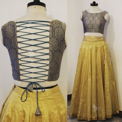 Elegance ia not just being noticed but being remembered! One such outfit to keep you remembered, a backless blouse with Criss cross knot paired with a simple gold lehenga! For Orders and Queries reach us at 044-42179088 or whatsapp:9789903599 Address: 21, Valmiki street, Thiruvanmyur, Chennai 600041. #momanddaughterlove #momanddaughterdress #bluenadgold #crisscross #backlessblouse #lehengabyyuti #anarkali #yuti #yutiforbrides #bridallehenga #yutiforbridesmaids #lehengabyyuti #YUTIDesignerHouse Criss Cross Blouse Design, Backless Blouse Designs For Lehenga, Blouse Designs For Saree, Criss Cross Blouse, Cross Knot, Gold Lehenga, Blouse Designs High Neck, Backless Blouse Designs, Saree Blouse Neck Designs