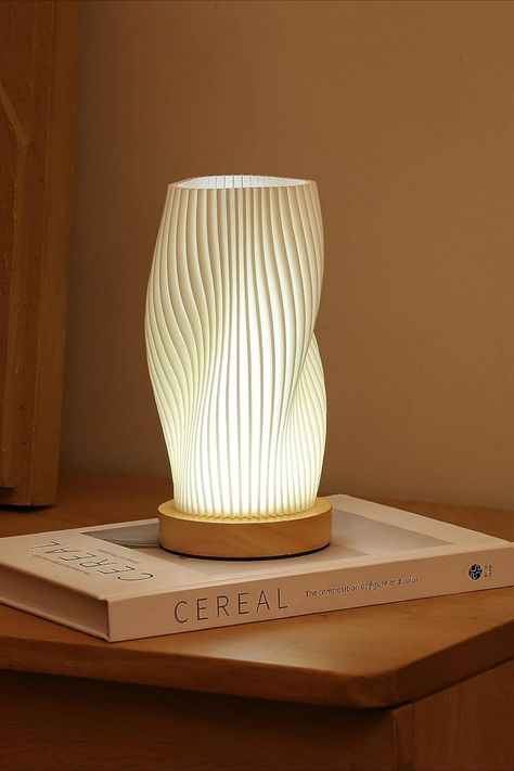 A bedside lamp with a wood base combines functionality with a touch of natural warmth. These lamps typically feature a wooden base that adds an organic and cozy element to your bedside table. The wood base can be crafted in various styles, from sleek and modern to rustic and vintage, allowing you to choose a lamp that complements your bedroom decor. Pair it with a shade that suits your taste to create a harmonious and stylish lighting solution for your bedside. Bedroom Finds, Classic Table Lamp, Nightstand Decor, Nightstand Lamp, Table Lamps For Bedroom, Lamp For Bedroom, Room Kids, Dimmable Lamp, Organic Modern Decor