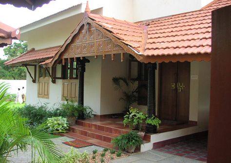 Architecture and interior design projects in India - Tarawad - Benny Kuriakose - Kerala Tile Roof House, Front House Arch Design, Chettinad House Entrance, Traditional Roof Design, Traditional House Elevation Design, Traditional Kerala House Elevation, Kerala Roof Design, Kerla Design House, House Roof Design Exterior