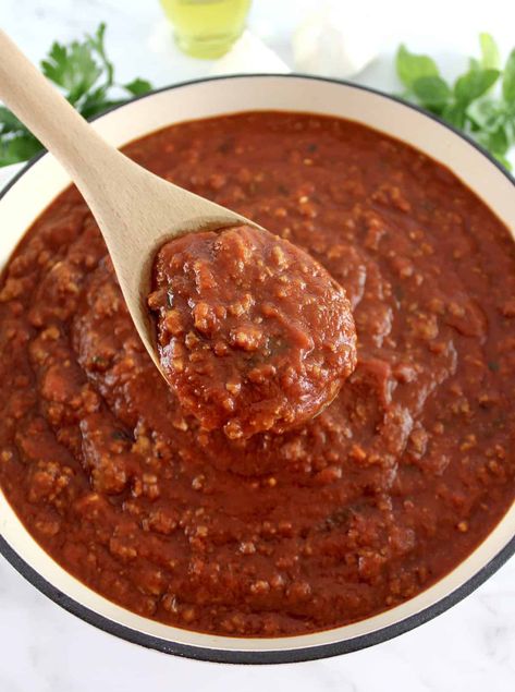 This Spaghetti with Meat Sauce is the real deal, made with rich, robust flavors from ground beef, Italian sausage, and fresh herbs. Simmered to perfection in a savory tomato sauce and tossed with pasta, it's a cozy meal you’ll make again and again. Meat Sauce With Jar Sauce, Easy Meat Sauce, Spaghetti With Meat Sauce, Spaghetti With Meat, Homemade Meat Sauce, Spaghetti Meat Sauce, Red Enchilada Sauce, Cozy Meals, Meat Sauce