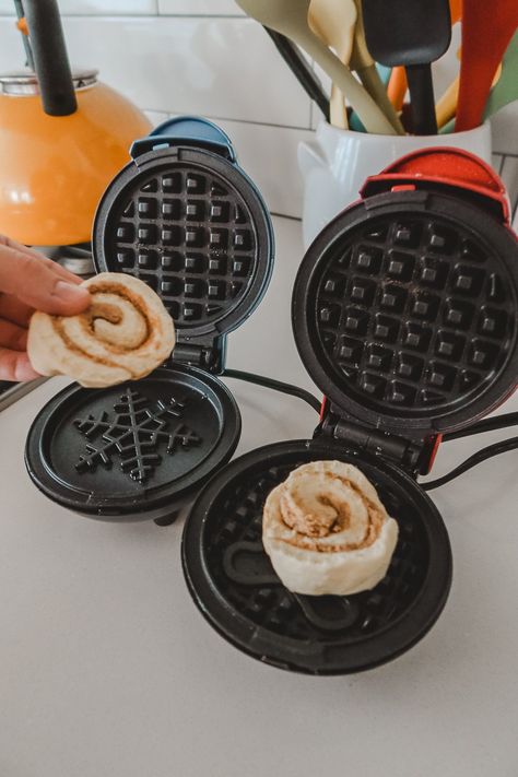 Looking for a tasty & super quick breakfast for Christmas to make under 10 minutes?!?! Try these cinnamon roll waffles! So fun to make & sure to be a crowd pleaser! Seminary Breakfast Ideas, Cinnamon Roll Waffle Maker, Waffles Dinner Ideas, Mini Waffle Maker Cinnamon Rolls, Pancake And Waffle Charcuterie Board, Cinnamon Roll In Waffle Maker, Breakfast With Waffles, Cinnamon Rolls Waffle Iron, Cinnamon Rolls In Waffle Maker