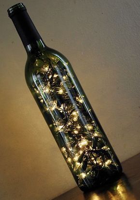 15 Ways To Decorate Your Wedding With Wine Bottles - Rustic Wedding Chic Diy Bottle Lamp, Wine Bottle Lights, Diy Wine Bottle, Bottle Decorations, Wine Bottle Centerpieces, Old Glass Bottles, Bottle Centerpieces, Rustic Wedding Chic, Wine Bottle Diy Crafts