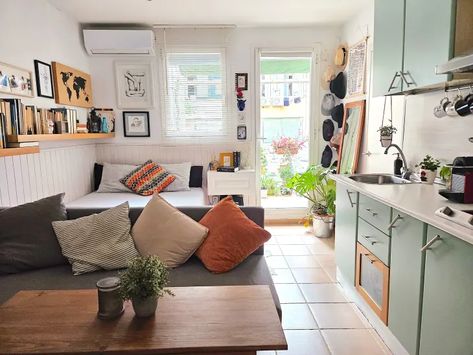 Tour a Small But Organized Barcelona Studio Apartment Rental | Apartment Therapy Micro Studio Apartment Ideas, Ikea Tv Console, Studio Apartment Organization, Minimal Bedrooms, 2023 Decor, Ikea Coffee Table, Ikea Tv, Tiny Balcony, Diy Side Table