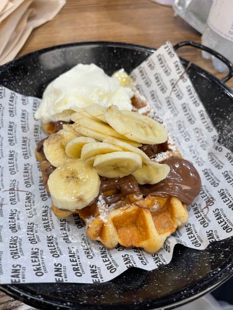 a photo of delicious banana and nutella waffles, food, dessert, waffles, nutella, bananas, whipped cream, sweet, bakery, restaurant, meal, dish, yummy, sugar, baking, cooking delicious delicacy, breakfast aesthetic restaurant aesthetic Waffles With Whipped Cream, Disney Nutella Waffle, Nutella Waffles Aesthetic, Waffles Aesthetic Chocolate, Nutella Waffles, Clotted Cream, Waffle Recipes, Whipped Cream, Aesthetic Food