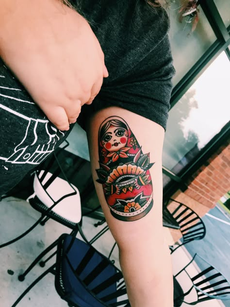 nesting doll by @lukeworleytattoo American Traditional Nesting Doll Tattoo, American Traditional Russian Doll Tattoo, Russian Nesting Doll Tattoo Traditional, Matroyska Doll Tattoo, Russian Doll Tattoo Traditional, American Traditional Feminine Tattoos, Doll Tattoo Ideas, Russian Nesting Doll Tattoo, Feminine American Traditional Tattoos