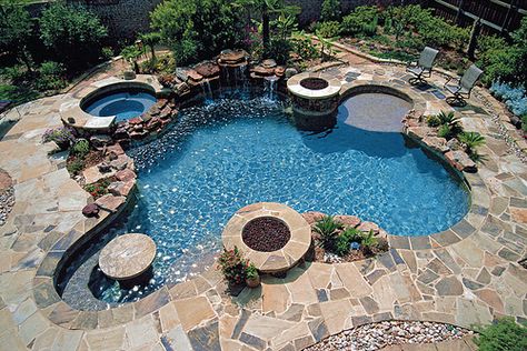 This is the perfect pool! ...hot tub area, eat up bar area, firepits, "deep end" area, a shallow tanning ledge, AND a waterfall.  Maybe one day... :) Ideas De Piscina, Living Pool, Diy Outdoor Decor, Dream Pools, Pool Bar, Dream Backyard, Cool Pools, Backyard Oasis, Pool Designs