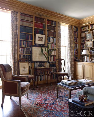 Library-The library features faux-bois-painted cabinetry and shelving, an armchair covered in a Claremont velvet, and a pair of Queen Anne chairs that belonged to Reed's great-grandmother; artworks on left include, from top, a William Christenberry photograph, a 19th-century map of Mississippi, and an Audubon print. Greek Revival Interiors, Julia Reed, New Orleans House, Historic Home Interiors, New Orleans Garden District, New Orleans Homes, Greek Revival, Home Libraries, Elegant Living