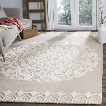 If your downtime consists of chasing littles ones and fur babies in the living room or serving your famous lasagna in a formal dining room, welcome in the feeling of home with a beige and ivory floral medallion pattern. Hand-tufted from 100% wool, its high-low pile means it’s easy to clean and allows doors to swing by freely in your high-traffic areas. Let its antiqued finish become the focal point of your master bedroom, then top it with a tufted settee and a faux fur blanket draped over the to Braided Rug Diy, Ivory Area Rug, Diy Rug, Ivory Rug, Formal Dining Room, Contemporary Area Rugs, Beige Rug, White Area Rug, Beige Area Rugs