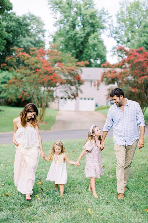 family of four holds hands and walks through Charlotte yard | Charlotte family session for family of four in their 1950's style ranch photographed by Charlotte NC family photographer Demi Mabry. #DemiMabry #LifestyleFamilyPhotos #NCFamilyPhotographer #AtHomeFamilyPhotos Family Holding Hands, Charlotte Family, Lifestyle Newborn Photos, Girl Tribe, Family Of Four, Lifestyle Newborn, Family Posing, By Charlotte, 1950s Fashion