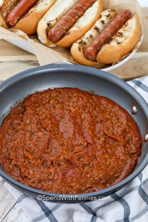 To enjoy this chili dog sauce at its finest, generously spoon it over your hot dog and garnish with chopped pickles and cheese. It's an effortless recipe that you can prepare in no time or store in the freezer for future use. With just ground beef, tomato sauce, and a blend of seasonings, you'll have a versatile and delightful condiment for any occasion! #chilisauce #hotdogchilisauce #condiment #hotdogchili #spendwithpennies Easy Hot Dog Chili Recipe, Ground Beef Tomato Sauce, Easy Hot Dog Chili, Pickles And Cheese, Beef Tomato Sauce, Chili Dog Sauce, Hotdog Chili Recipe, Hot Dog Chili Sauce, Beef Tomato