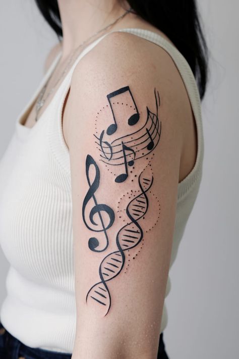 For music lovers, blend DNA with musical notes to show that music runs through your veins. This creative design is perfect for the arm, where the DNA helix can wrap around with tiny notes spiraling along. Dna Tattoo Ideas, Tiny Notes, Dahlia Tattoo, Dna Tree, Abstract Art Tattoo, Spiral Tattoos, Dna Tattoo, Dna Helix, Animal Sleeve Tattoo