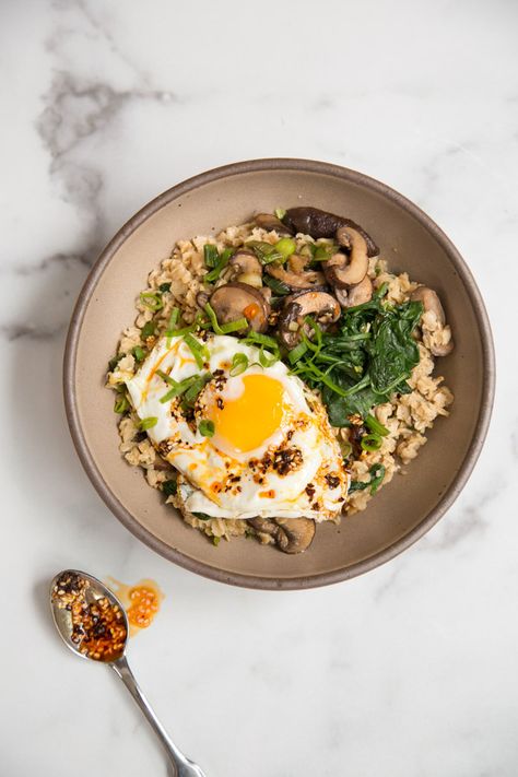 Of all the savory oatmeal recipes I’ve developed, this miso mushroom version inspired by salty congee is one of my favorites. The toppings, which include wilted spinach and scallions, are completely vegan, but you can also make this gluten-free oat recipe with a fried or jammy egg for added protein. Salty Oatmeal Recipes, Oatmeal Savory, Savory Oatmeal Recipes, Egg Spinach, Mushroom Breakfast, Savory Oatmeal, Wilted Spinach, Gluten Free Oatmeal, Gluten Free Oats