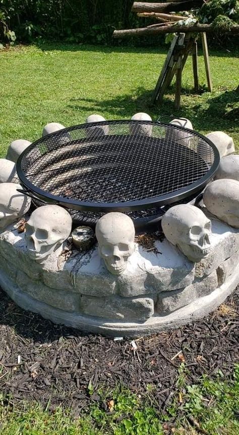 Skull Fire Pit, Fire Pit Skulls, Outdoor Fireplace Plans, Skull Fire, Goth Garden, Fire Pit Ring, Black Light Posters, Gothic Garden, Diy Fire Pit