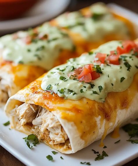 Smothered Baked Chicken Burritos Recipe - emiliarecipes.com Smothered Baked Chicken Burritos, Mexican Rotisserie Chicken Recipes, Chicken Wet Burrito Recipe, Smothered Chicken Burritos, Baked Chicken Burritos, Smothered Baked Chicken, Chicken Burritos Recipe, Baked Burritos, Marry Me Chicken Pasta