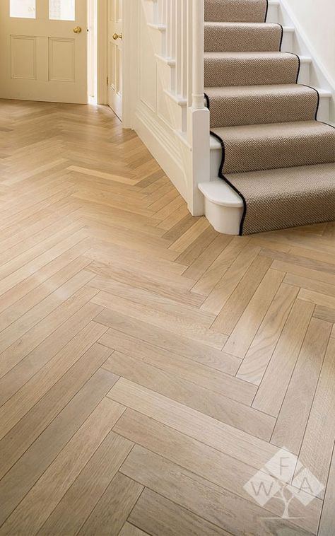 What is not to love about a beautifully installed herringbone wood floor, that is sure to catch the attention of everyone that walks into your home. Herringbone Floor Hallway Entryway, Living Room Chevron Floor, Neutral Herringbone Floor, Herringbone Wood Floor Bedroom, Light Flooring Ideas, Herringbone Border Floor, Herringbone Floor Hallway, Living Room With Carpet Floors, Herringbone Engineered Wood Floor