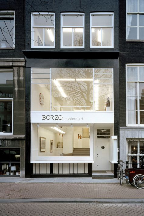 Borzo Galerie | Amsterdam | #architecture large and small opening balance metal framing black facade white frame Store Exterior Design, Design Inspiration Architecture, Store Exterior, Retail Facade, Shop Facade, Storefront Design, Shop Front Design, Building Facade, Shop Front