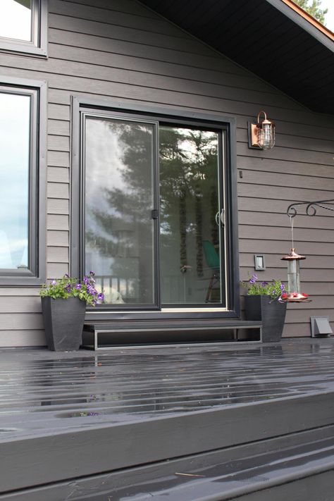 Dark Grey Siding with Black Trim and Black Deck Grey Wooden House Exterior, Exterior House Colors Ideas Paint Colours, Dark Grey Windows Exterior, Craftsman Dark Exterior, Grey Siding With Black Trim, Greige Exterior House Colors Dark Trim, House Exterior With Black Windows, Monochromatic Exterior House Colors, Blue Grey House Exterior